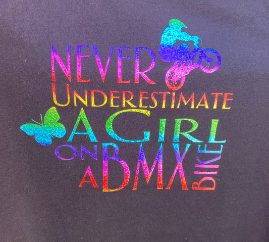 Never Underestimate a Girl - Rainbow glitter print